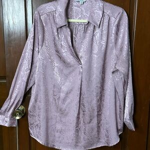 Stunningly, beautiful woman’s plus size one X blouse